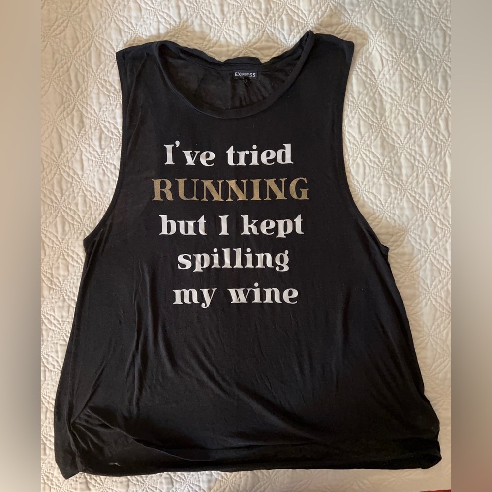 Running T-shirt humorous. “ I’ve tried running, but I kept spilling my wine.”